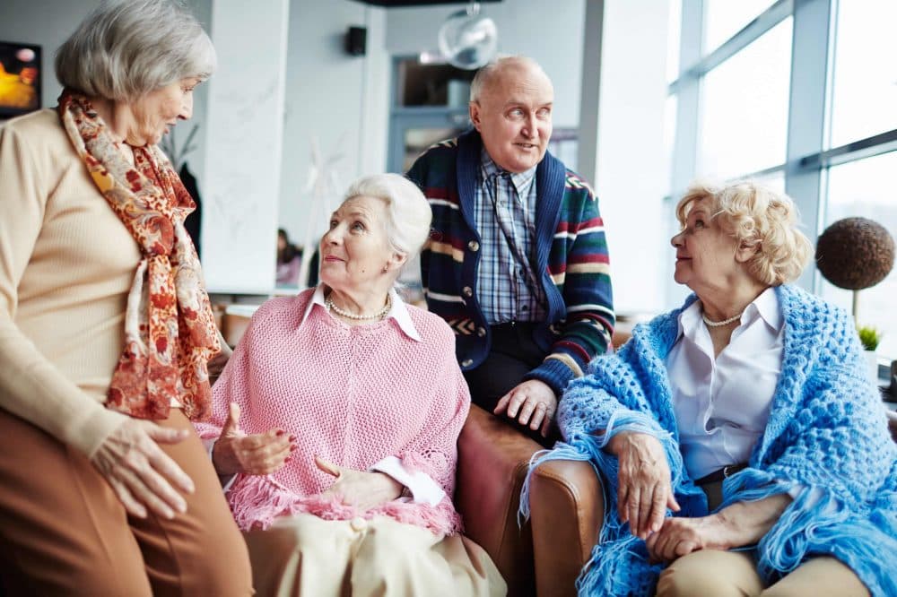 Residents enjoying community life at Pine Lodge
