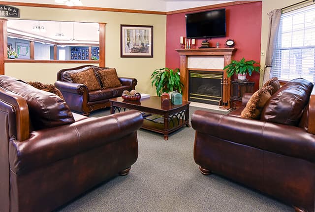 Pine Lodge apartment interior with kitchenette and ensuite bathroom
